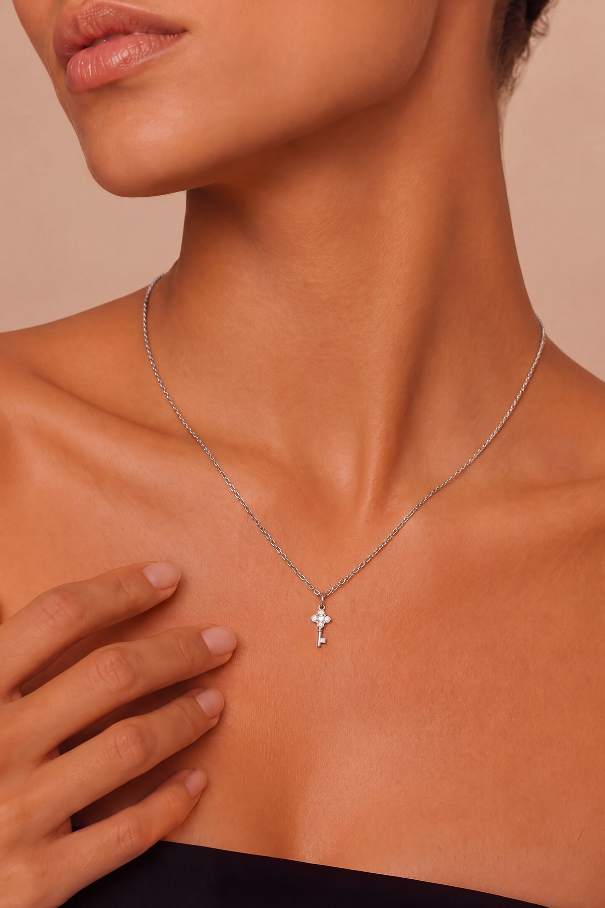 Model wearing Clover Key Pendant Silver – Clair de Lune