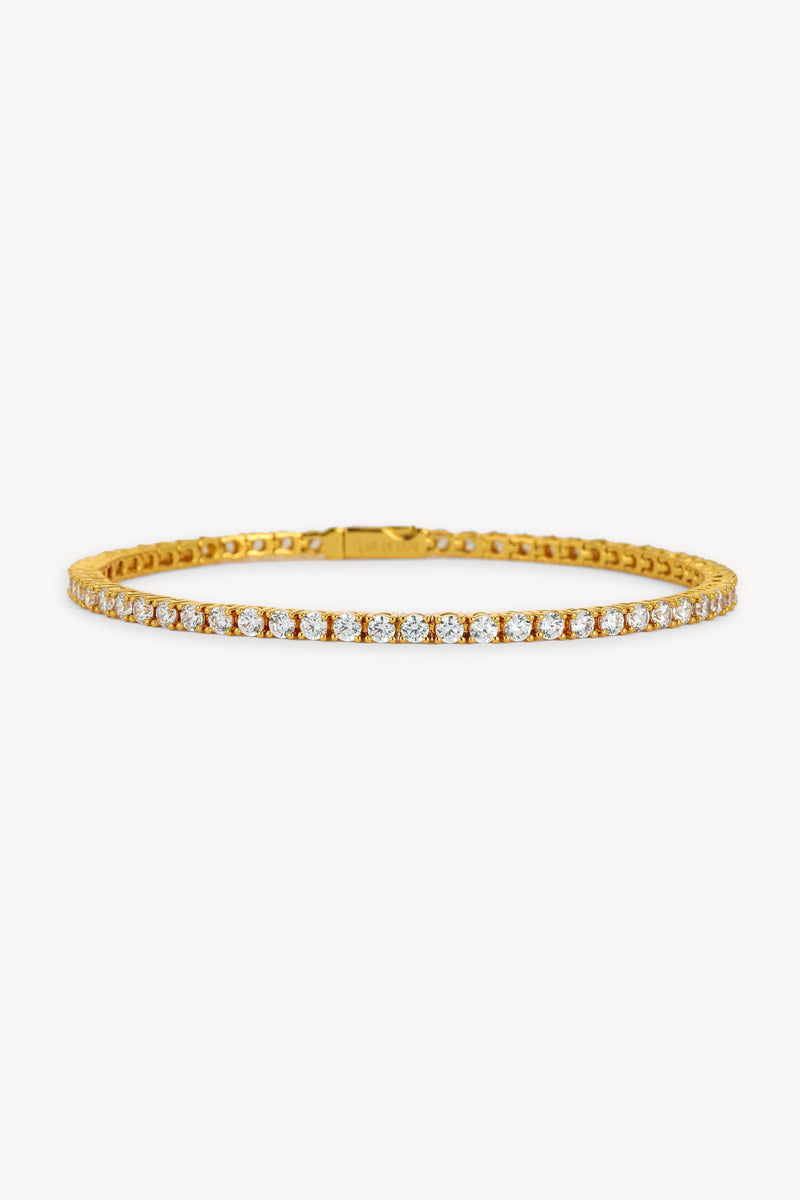 Gold tennis bracelet by Clair De Lune