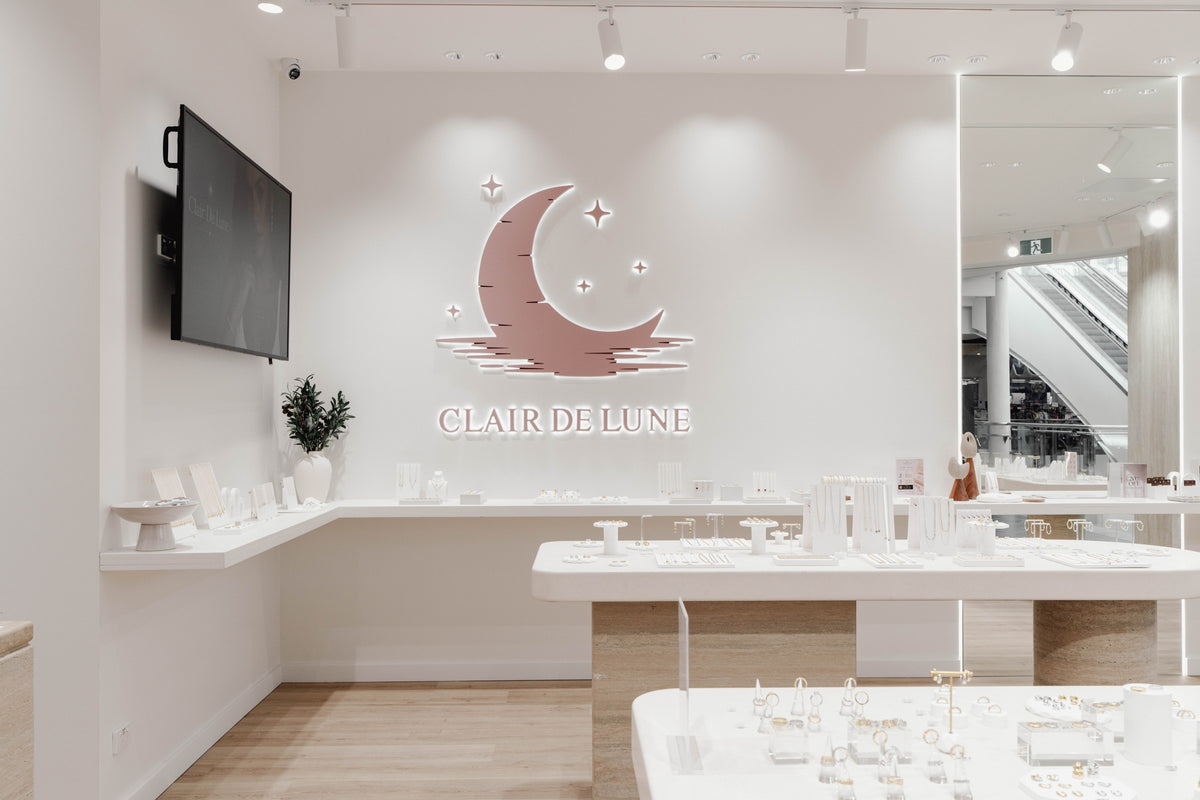 Crescent moon logo and jewellery displays at Clair De Lune