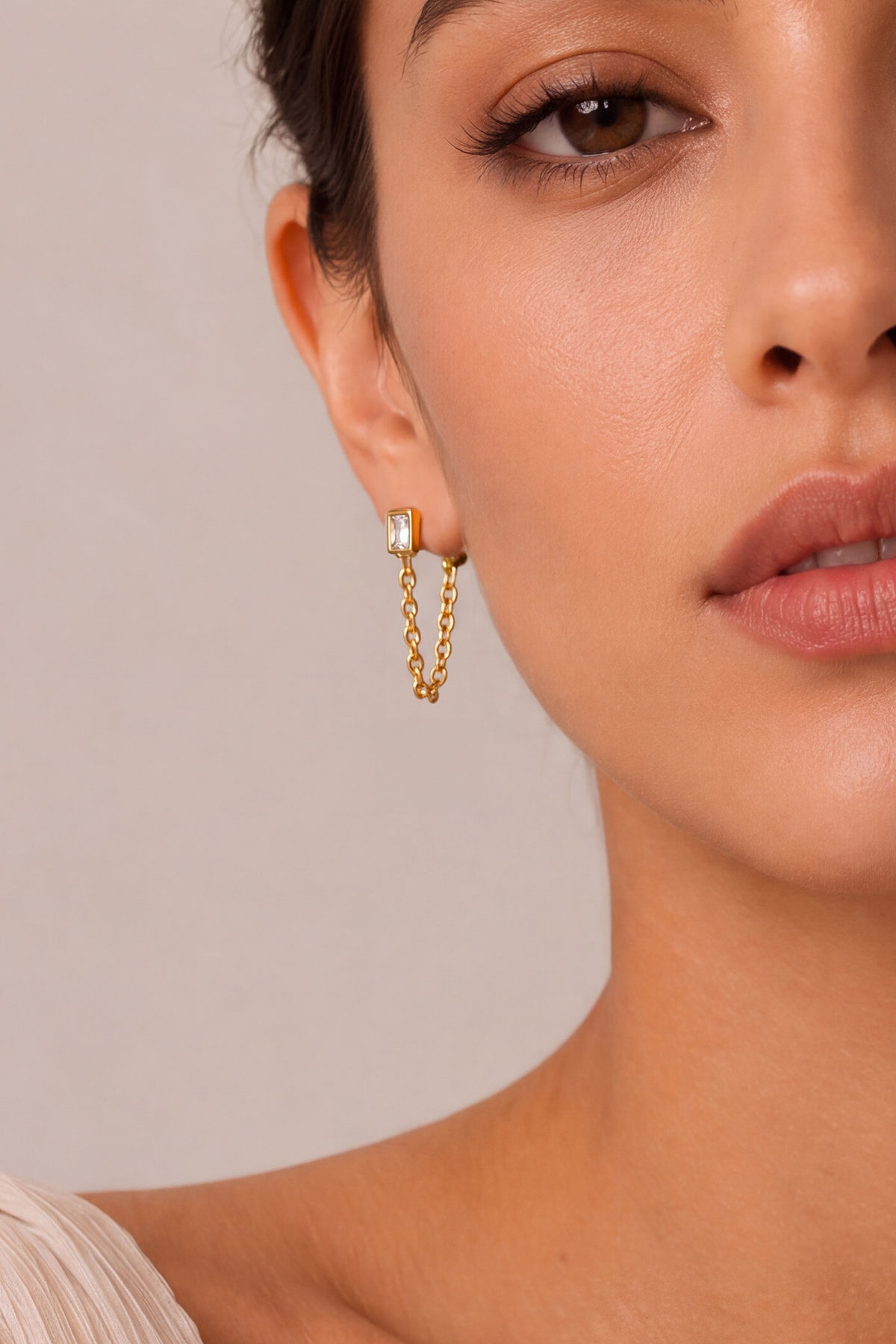 Model wearing Rect Crystal Chain Studs Gold – Clair de Lune